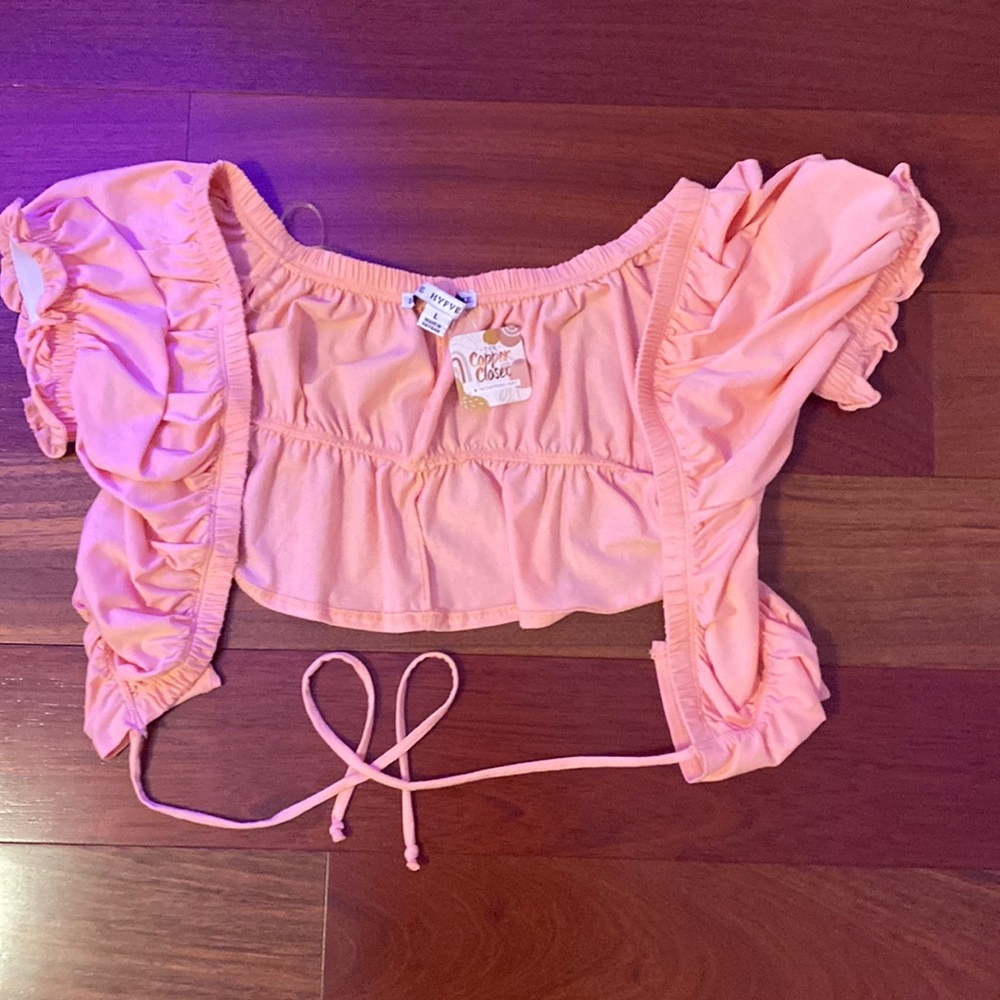 BRAND NEW shirt from The Copper Closet. NEVER WORN AND ALSO STILL HAS THE TAG.